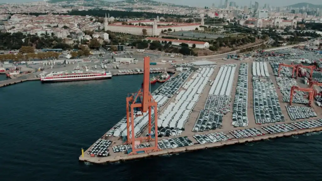 Aerial view of a bustling car shipping terminal in Istanbul, Türkiye, showcasing a busy port with ve